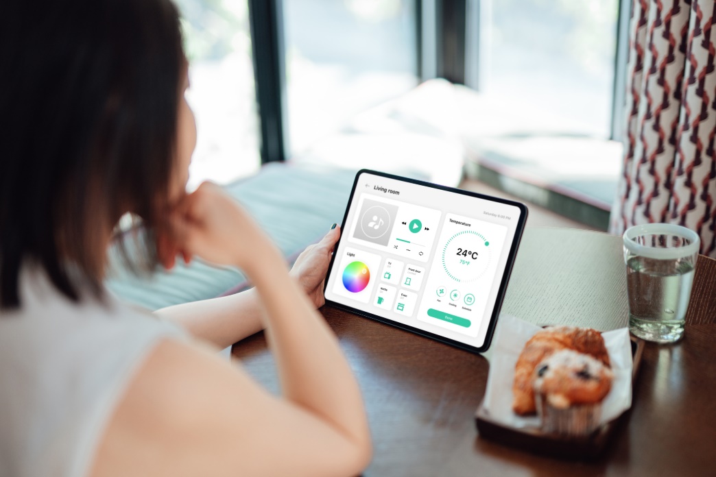 Woman Reading on a Tablet